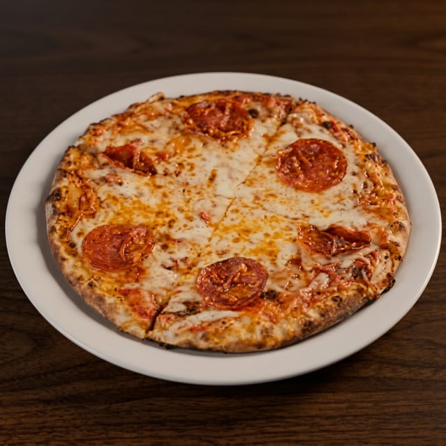 10 Inch One Topping Pizza.